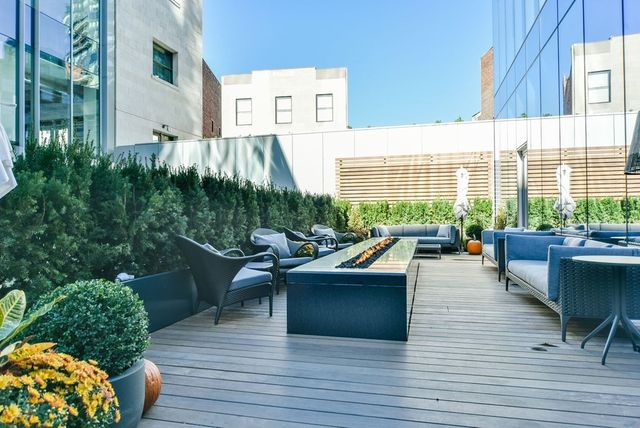 a building outdoor space with patio furniture