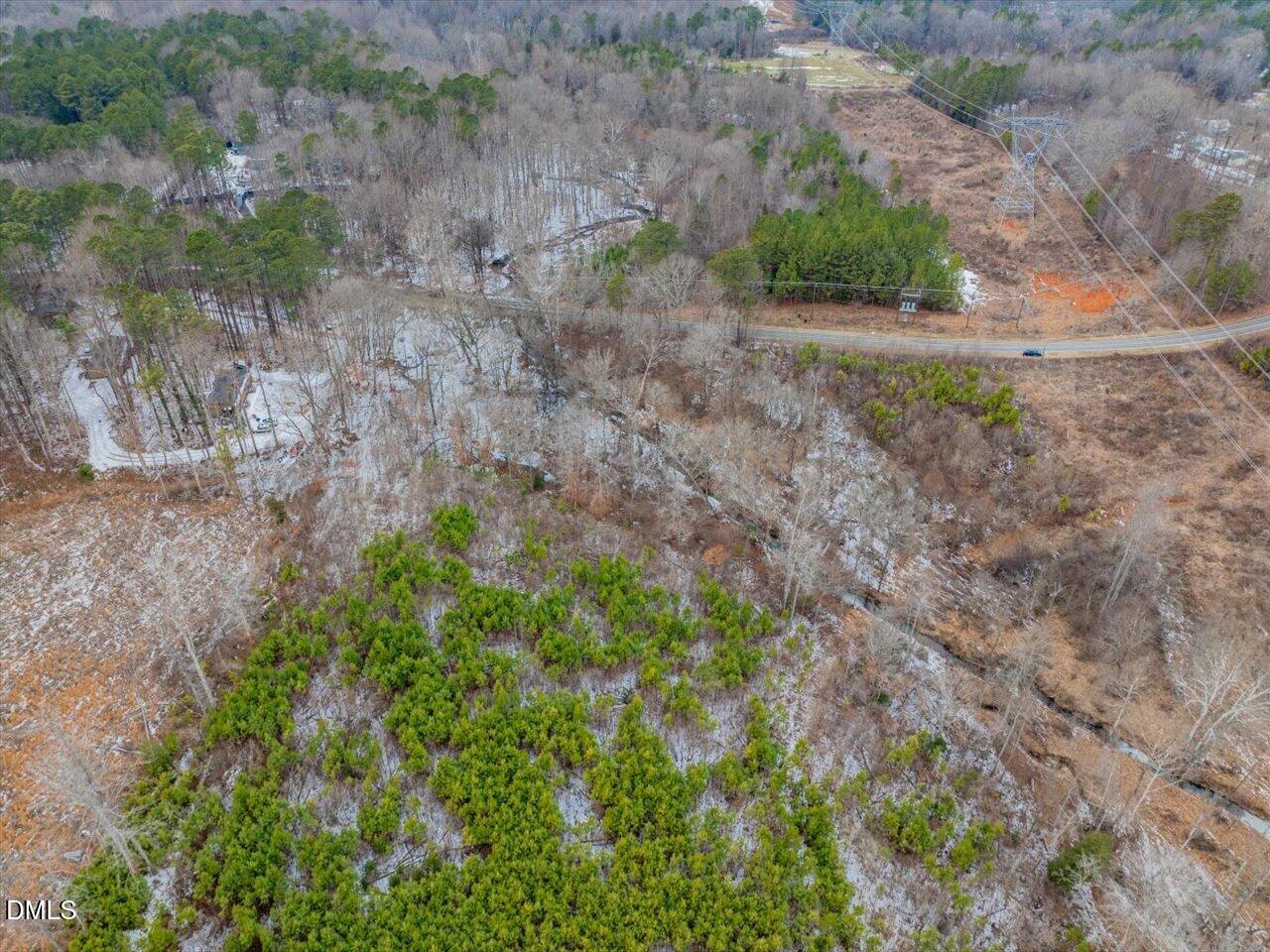 558 Jones Ferry Road Pittsboro, NC 27312 - Photo 8 of 19 a view of a yard with a tree