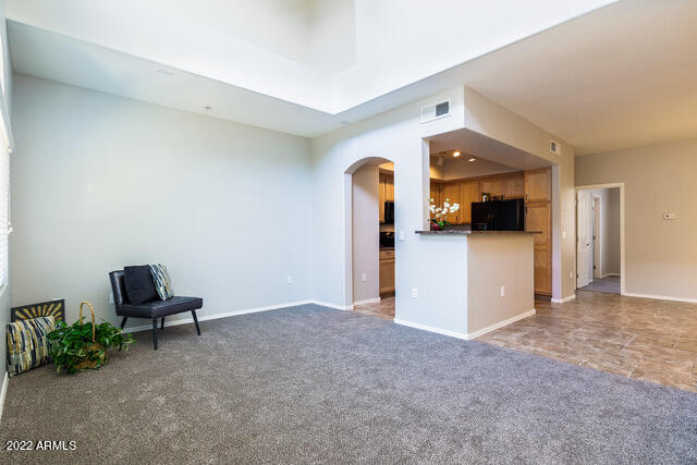 2150 West Alameda Road, Unit 1399 Phoenix, AZ 85085 - Photo 6 of 36 Living to Kitchen