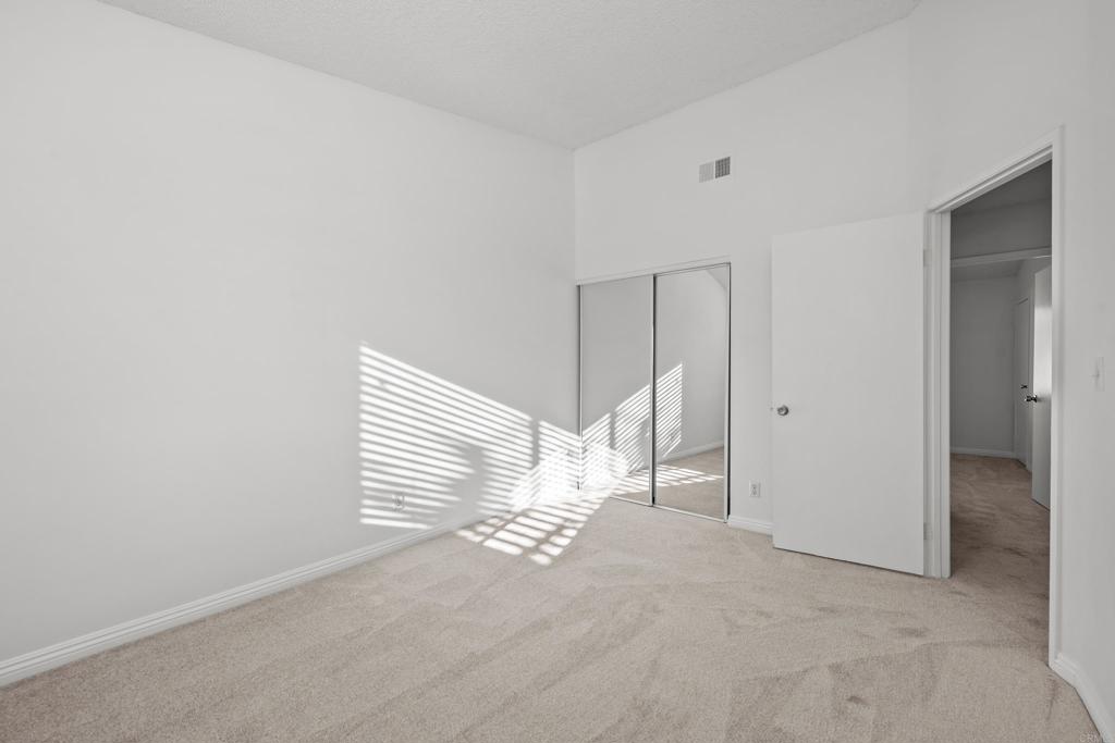 5120 North River Road, Unit E Oceanside, CA 92057 - Photo 9 of 13 a view of empty room