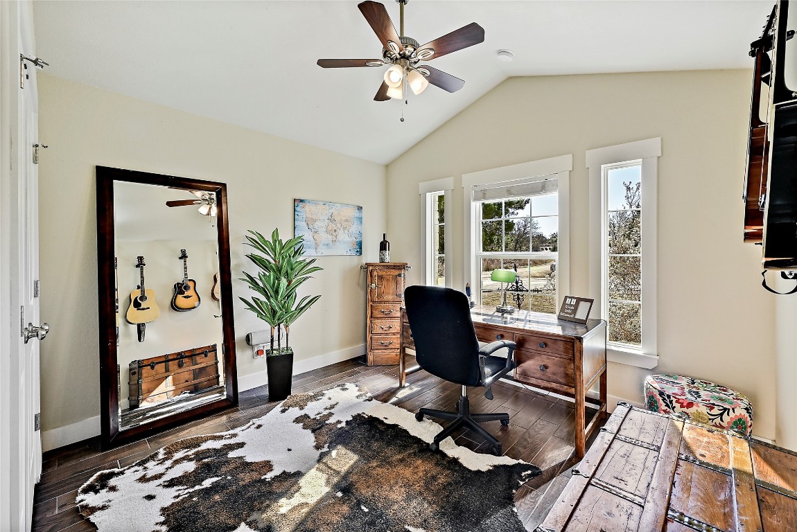 1 Rolling Hills Road Wimberley, TX 78676 - Photo 15 of 30 a workspace with furniture and a window