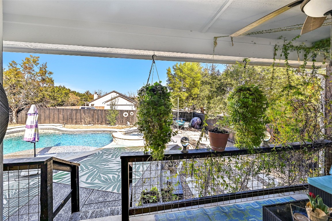 1 Rolling Hills Road Wimberley, TX 78676 - Photo 23 of 30 a view of a lake from a balcony