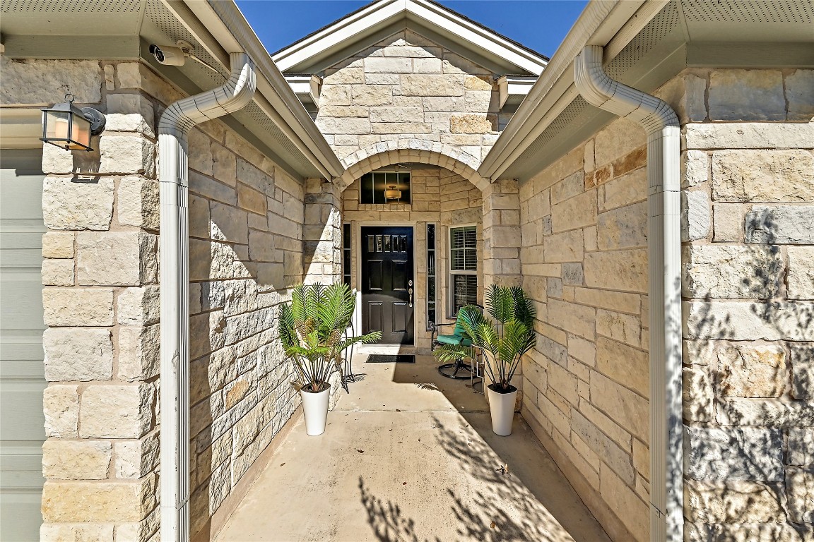 1 Rolling Hills Road Wimberley, TX 78676 - Photo 4 of 30 a view of entrance door of the house