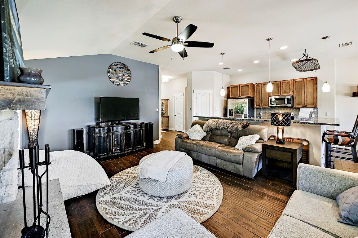 1 Rolling Hills Road Wimberley, TX 78676 - Photo 8 of 30 a living room with furniture and a flat screen tv