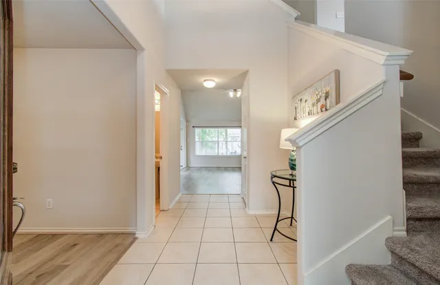 a view of an entryway with a rug