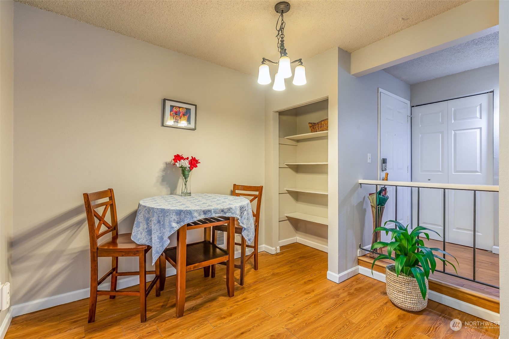 17533 151st Avenue Southeast, Unit 7 Renton, WA 98058 - Photo 3 of 30 a view of a dining room with furniture and wooden floor
