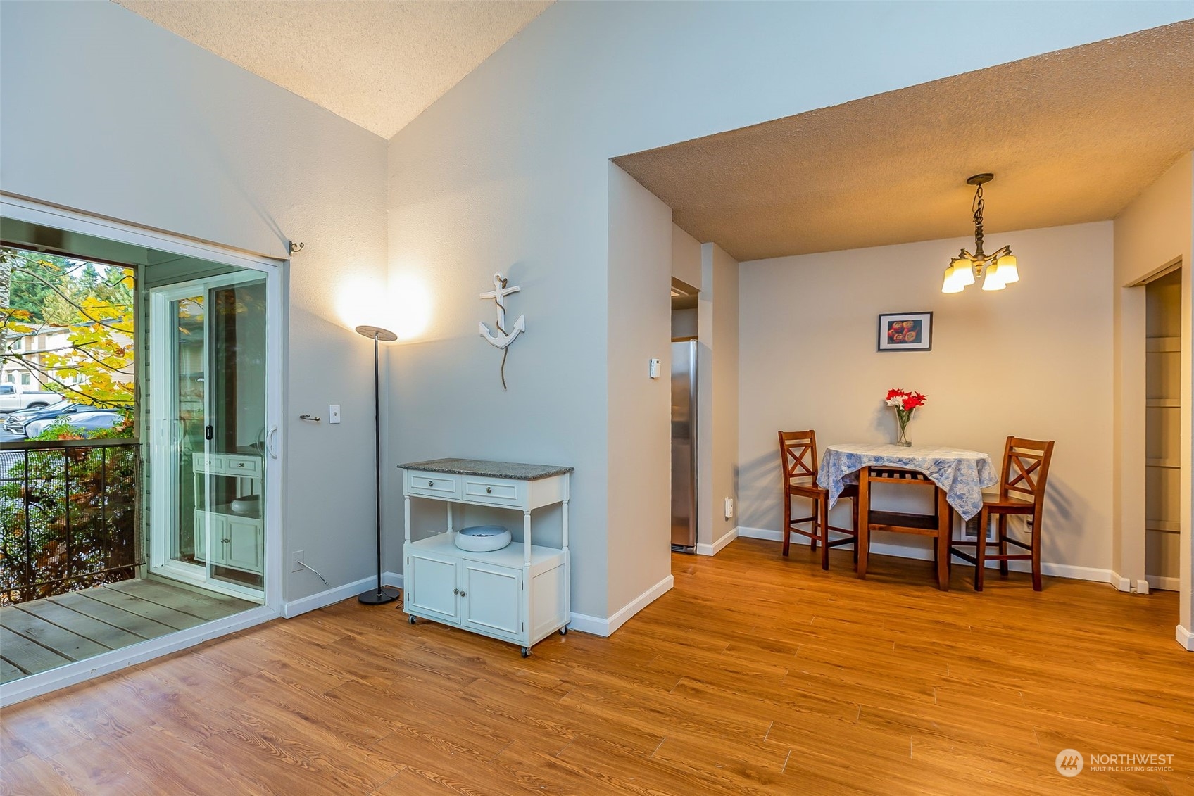 17533 151st Avenue Southeast, Unit 7 Renton, WA 98058 - Photo 5 of 30 a workspace room with furniture and wooden floor