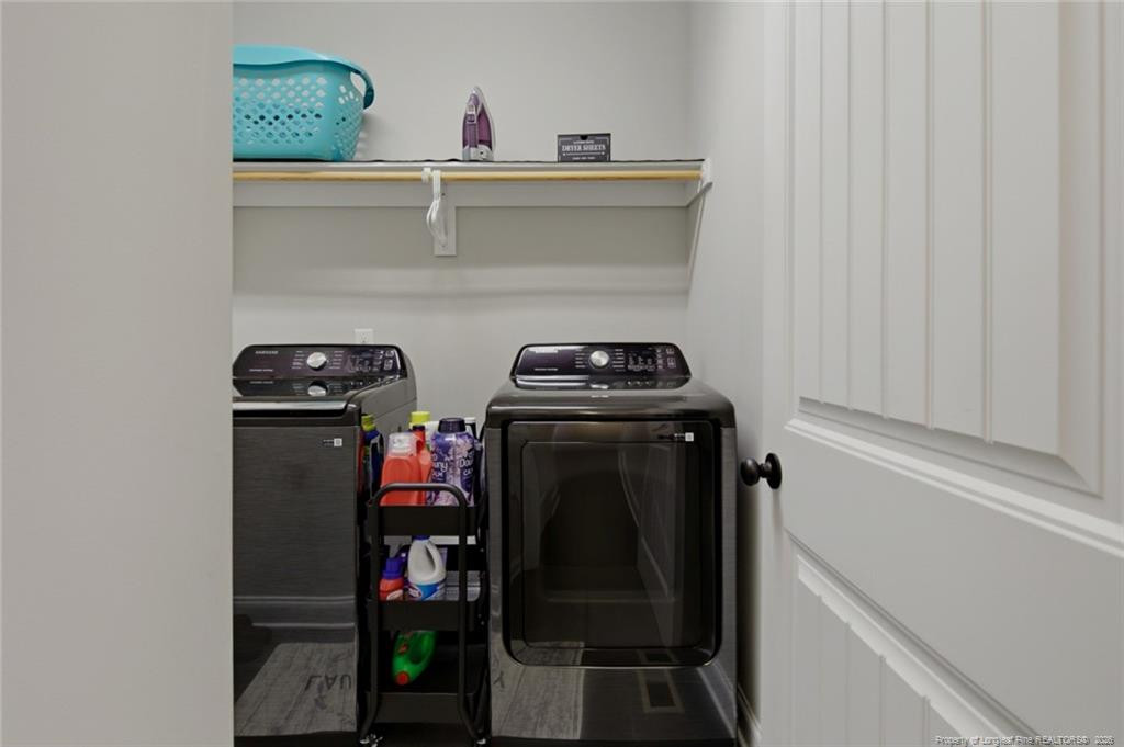 95 Valley Brook Lane Spring Lake, NC 28390 - Photo 19 of 49 a view of a utility room with washer and dryer