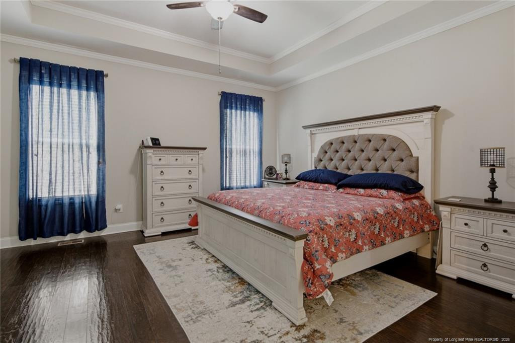 95 Valley Brook Lane Spring Lake, NC 28390 - Photo 20 of 49 a bedroom with a bed and a dresser