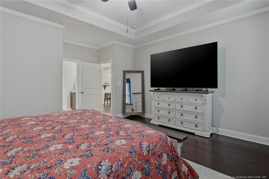 95 Valley Brook Lane Spring Lake, NC 28390 - Photo 22 of 49 a bedroom with a bed and flat screen tv