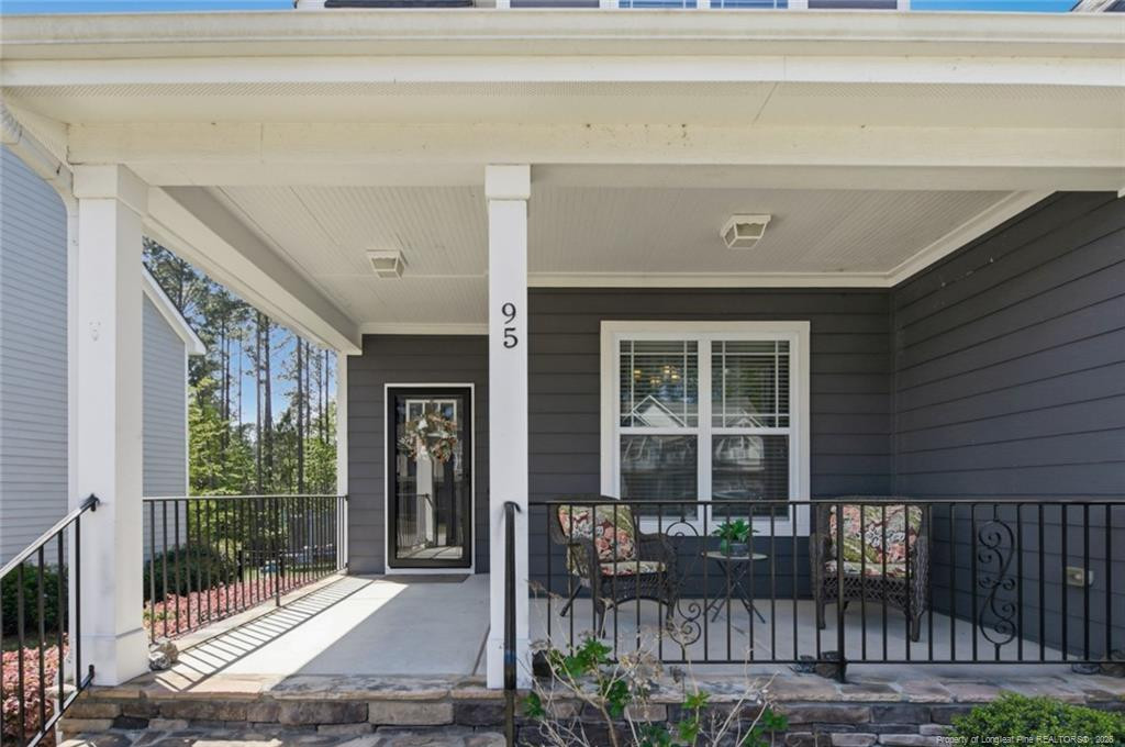 95 Valley Brook Lane Spring Lake, NC 28390 - Photo 3 of 49 a front view of a house with a porch