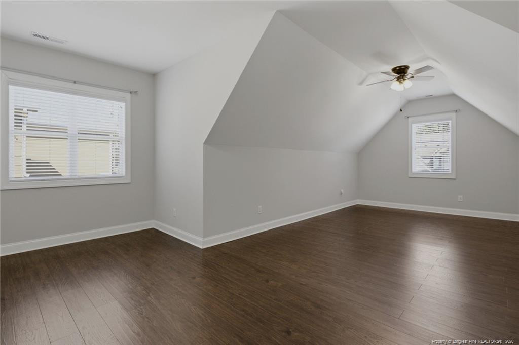 95 Valley Brook Lane Spring Lake, NC 28390 - Photo 33 of 49 an empty room with wooden floor and windows