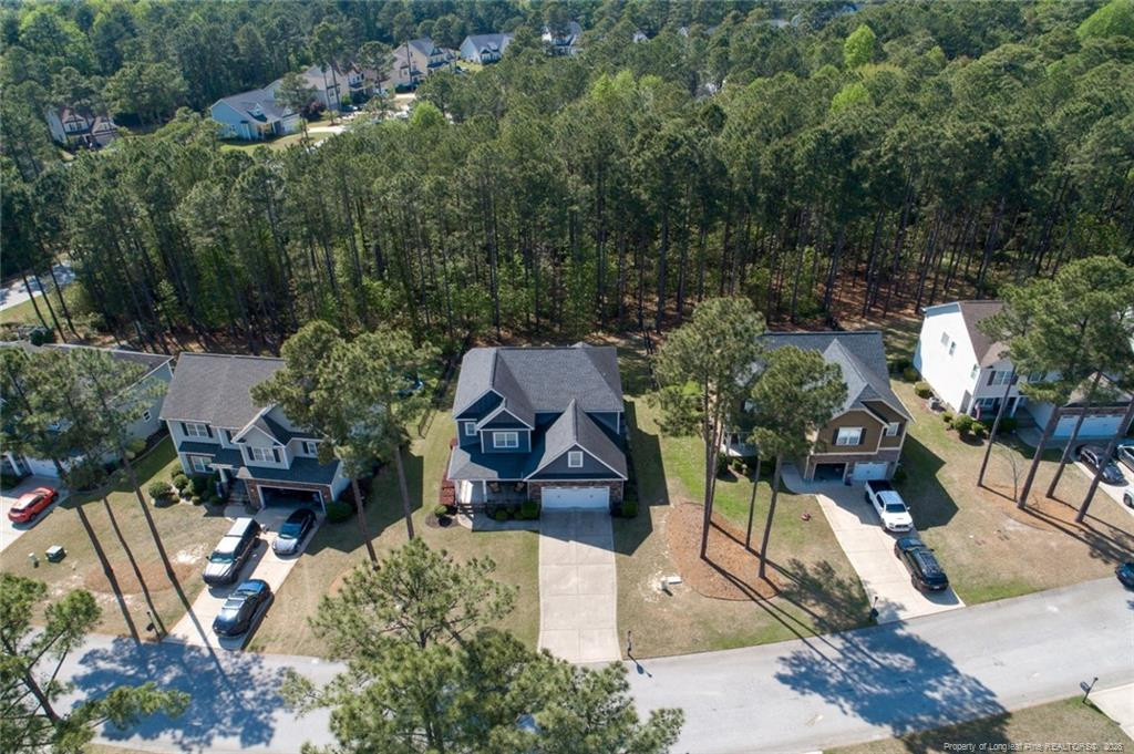95 Valley Brook Lane Spring Lake, NC 28390 - Photo 45 of 49 an aerial view of a house with garden space and sitting area