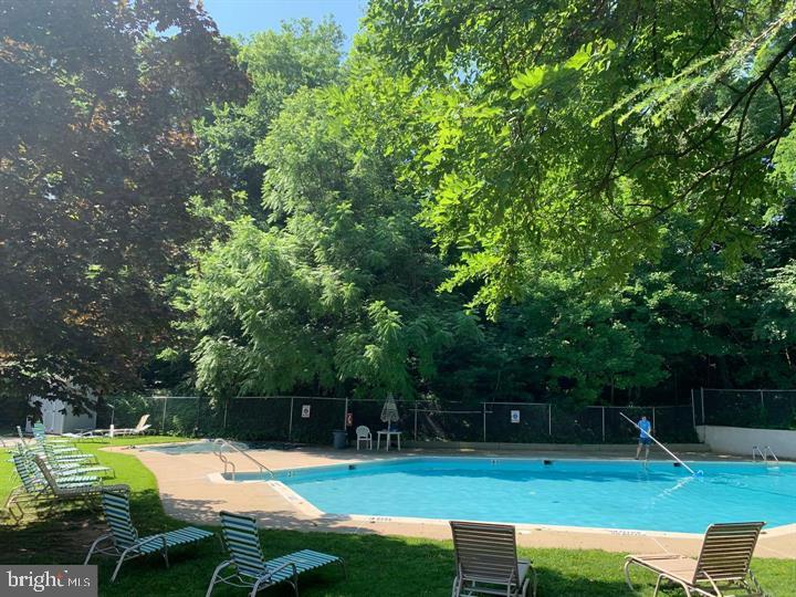 1610 Yardley Commons Yardley, PA 19067 - Photo 11 of 13 a view of a swimming pool with a patio