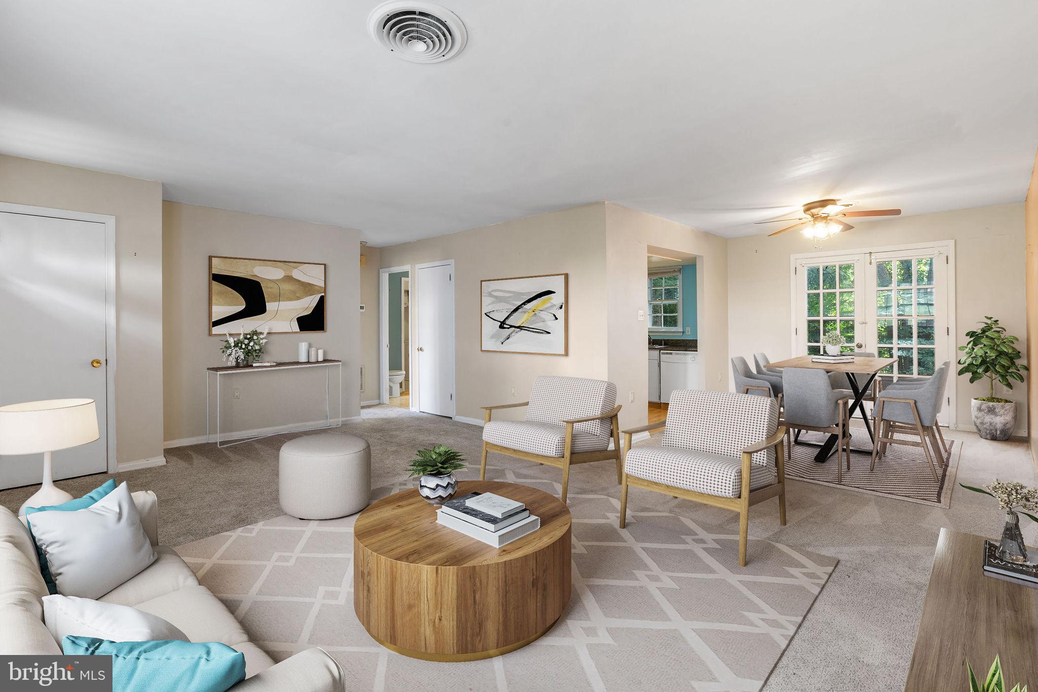 1610 Yardley Commons Yardley, PA 19067 - Photo 2 of 13 a living room with furniture and a large window
