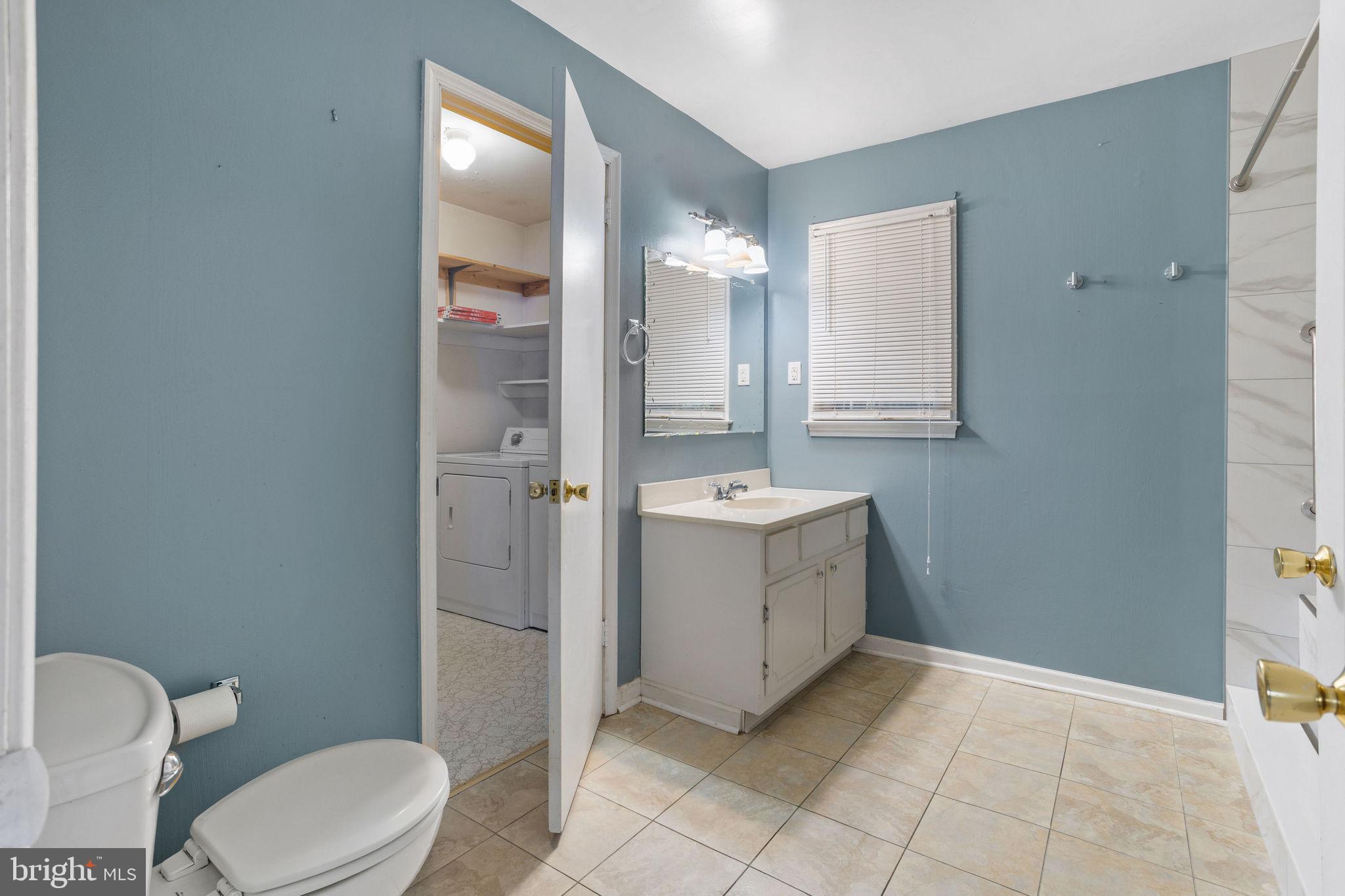 1610 Yardley Commons Yardley, PA 19067 - Photo 5 of 13 a bathroom with a sink a toilet and shower