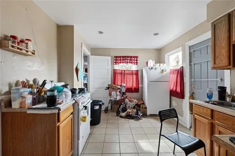 a view of a room with workspace and a window