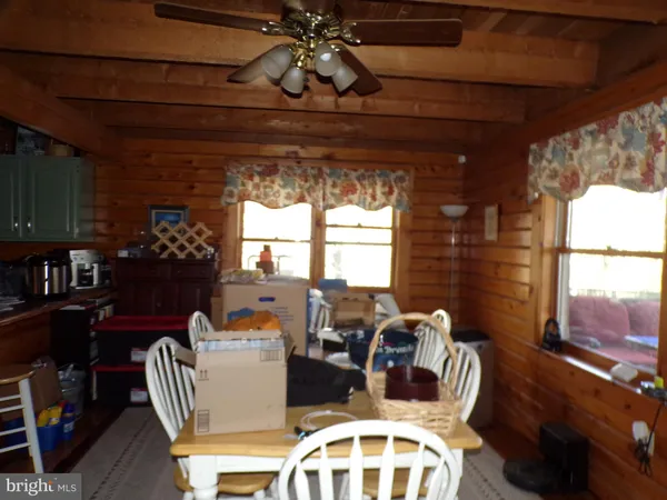 a kitchen with a sink and a stove top oven