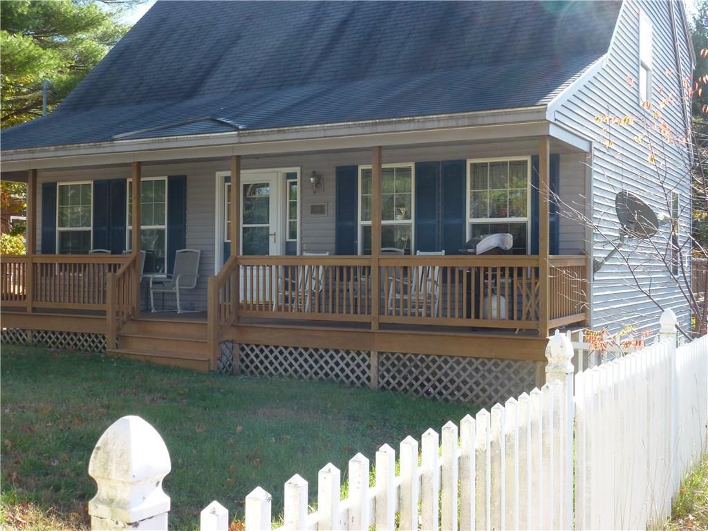 136 Old Mill Road Sanford, ME 04073 - Photo 7 of 29 Great farmer's porch to relax on.