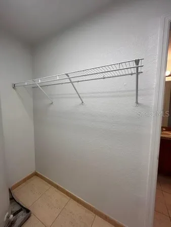 a view of a room with racks on the wall