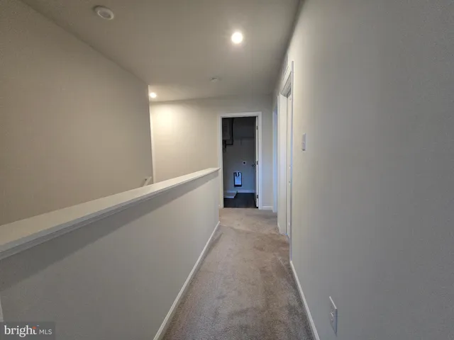 a view of hallway with stairs