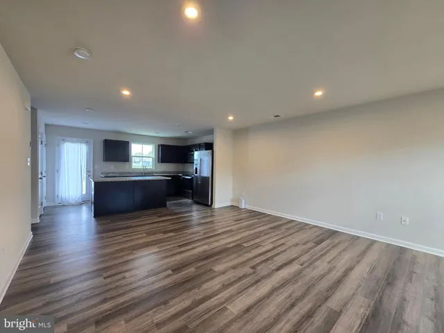 a view of kitchen with wooden floor