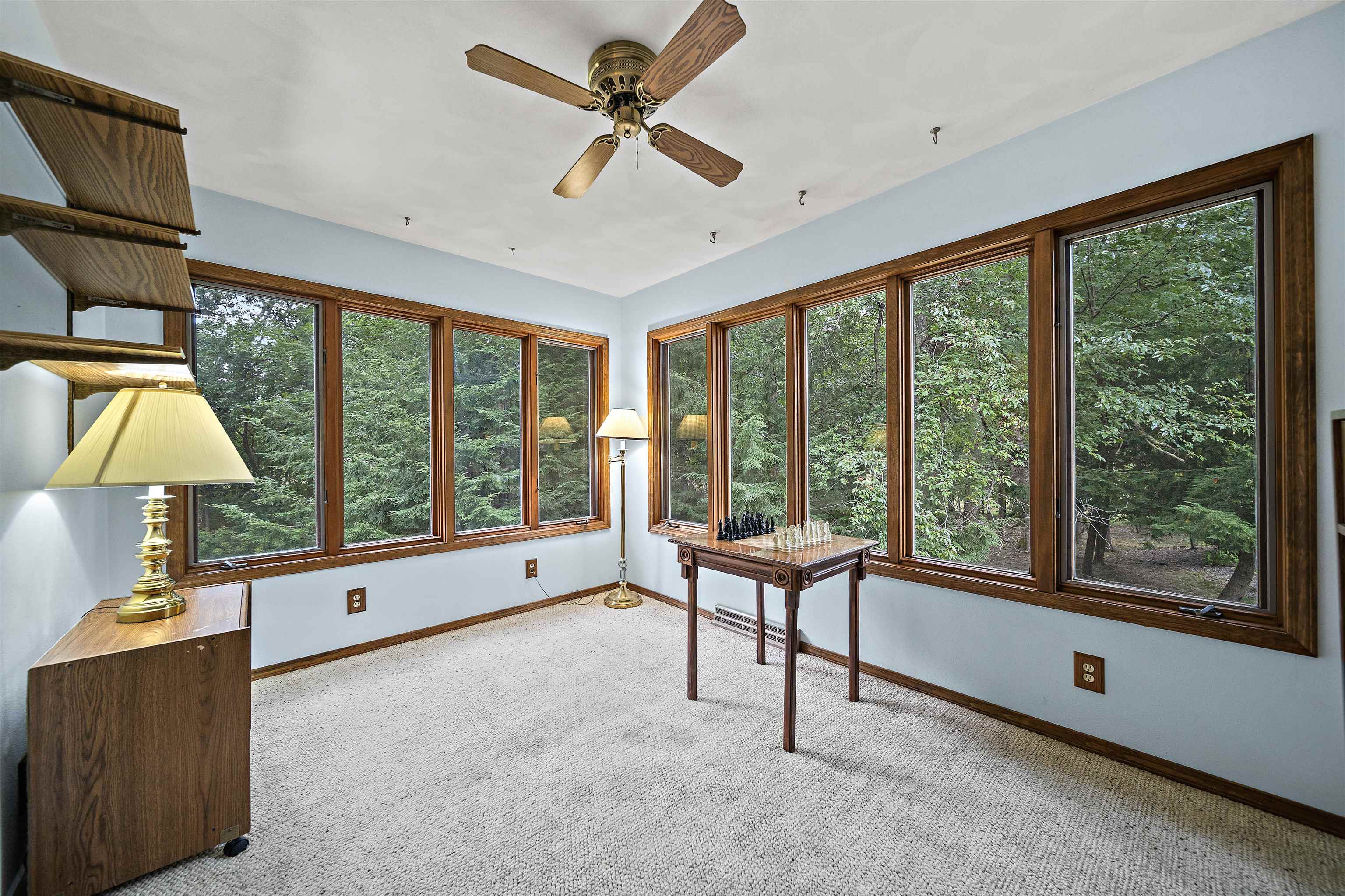 692 Sioux Drive Freeport, IL 61032 - Photo 11 of 36 a living room with furniture and a floor to ceiling window