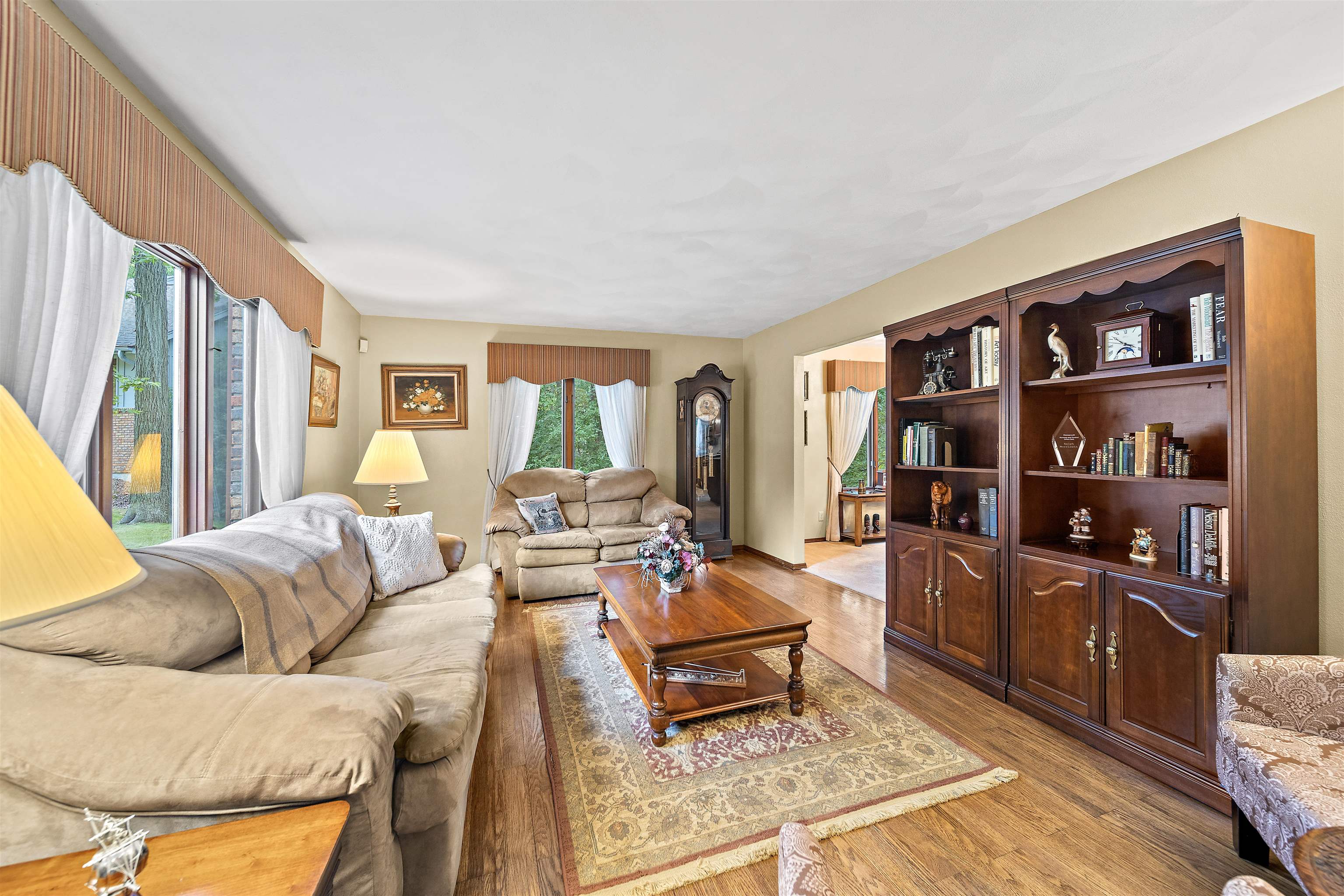 692 Sioux Drive Freeport, IL 61032 - Photo 2 of 36 a living room with furniture a rug and a large window