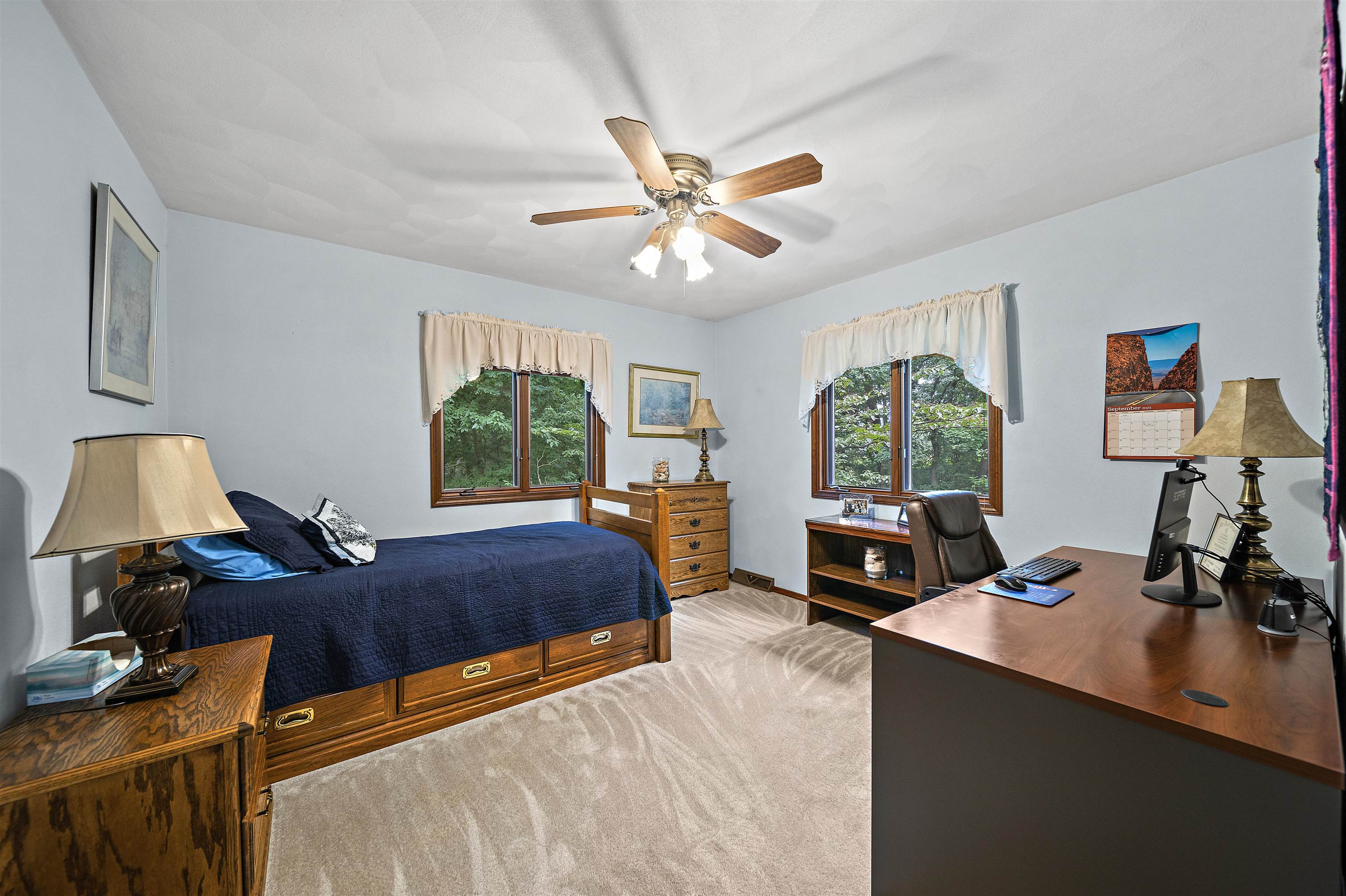 692 Sioux Drive Freeport, IL 61032 - Photo 22 of 36 a bedroom with a bed and a large window