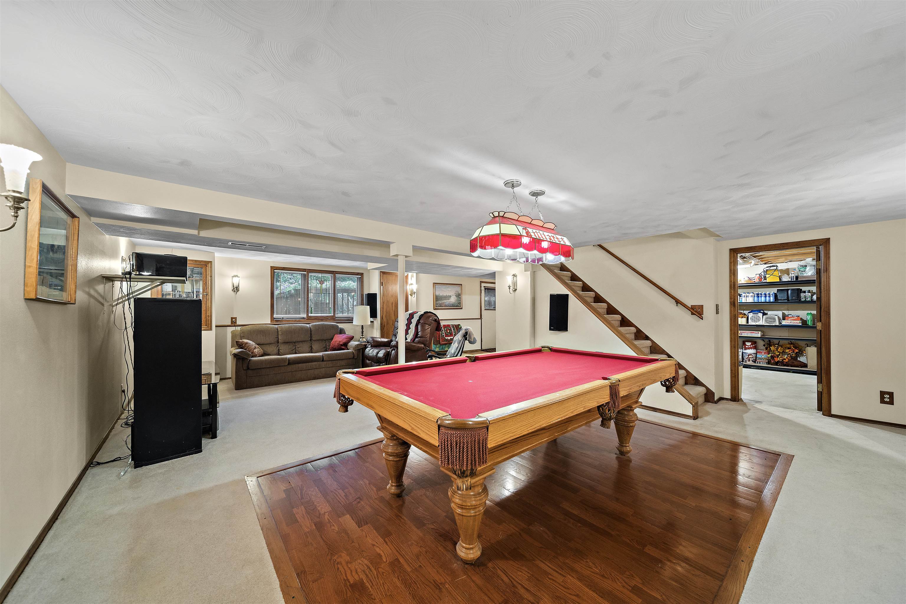 692 Sioux Drive Freeport, IL 61032 - Photo 23 of 36 a living room with furniture a pool table and a fireplace