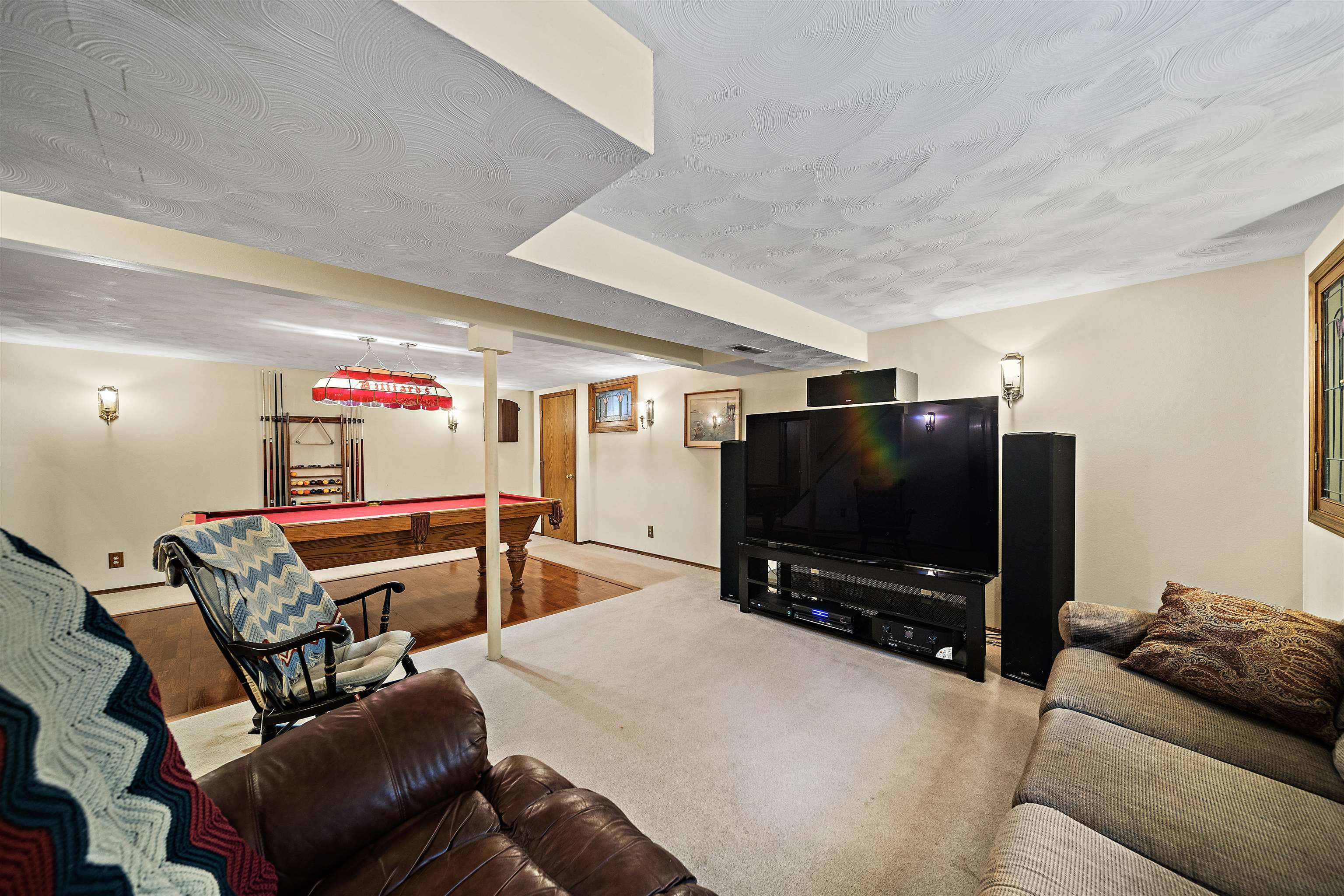 692 Sioux Drive Freeport, IL 61032 - Photo 24 of 36 a living room with furniture and a flat screen tv