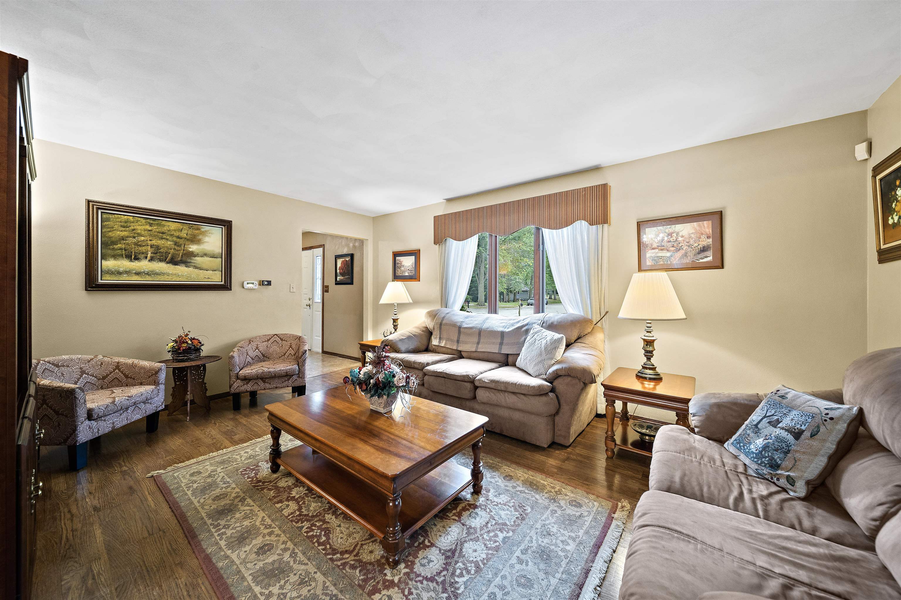 692 Sioux Drive Freeport, IL 61032 - Photo 3 of 36 a living room with furniture a rug and a window