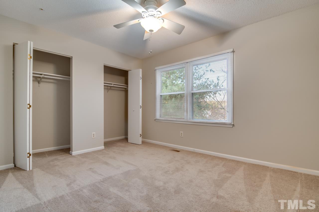 17 Prestwick Place, Unit 17 Durham, NC 27705 - Photo 15 of 27 an empty room with windows and closet