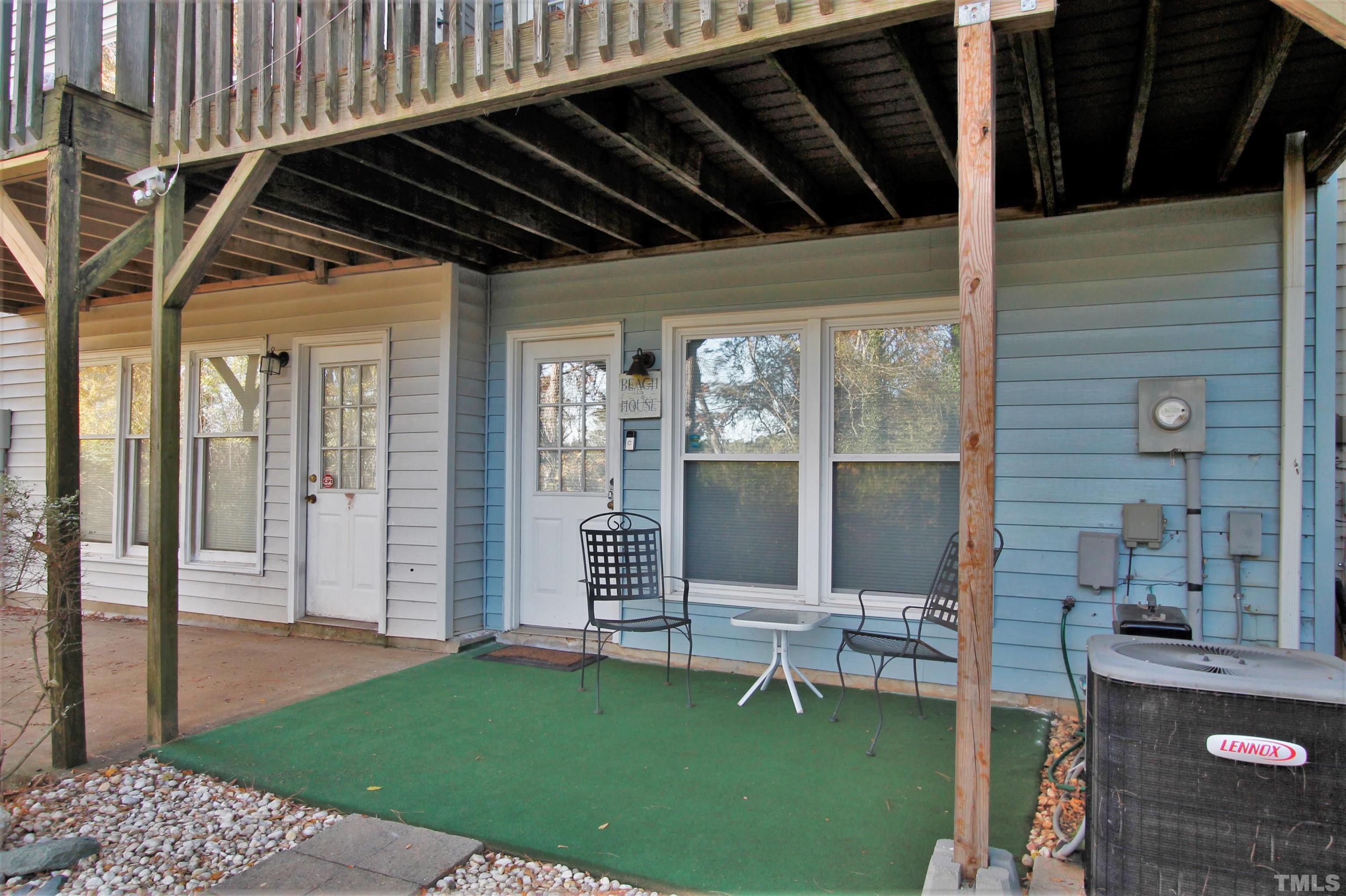 17 Prestwick Place, Unit 17 Durham, NC 27705 - Photo 19 of 27 a porch with a table and chairs