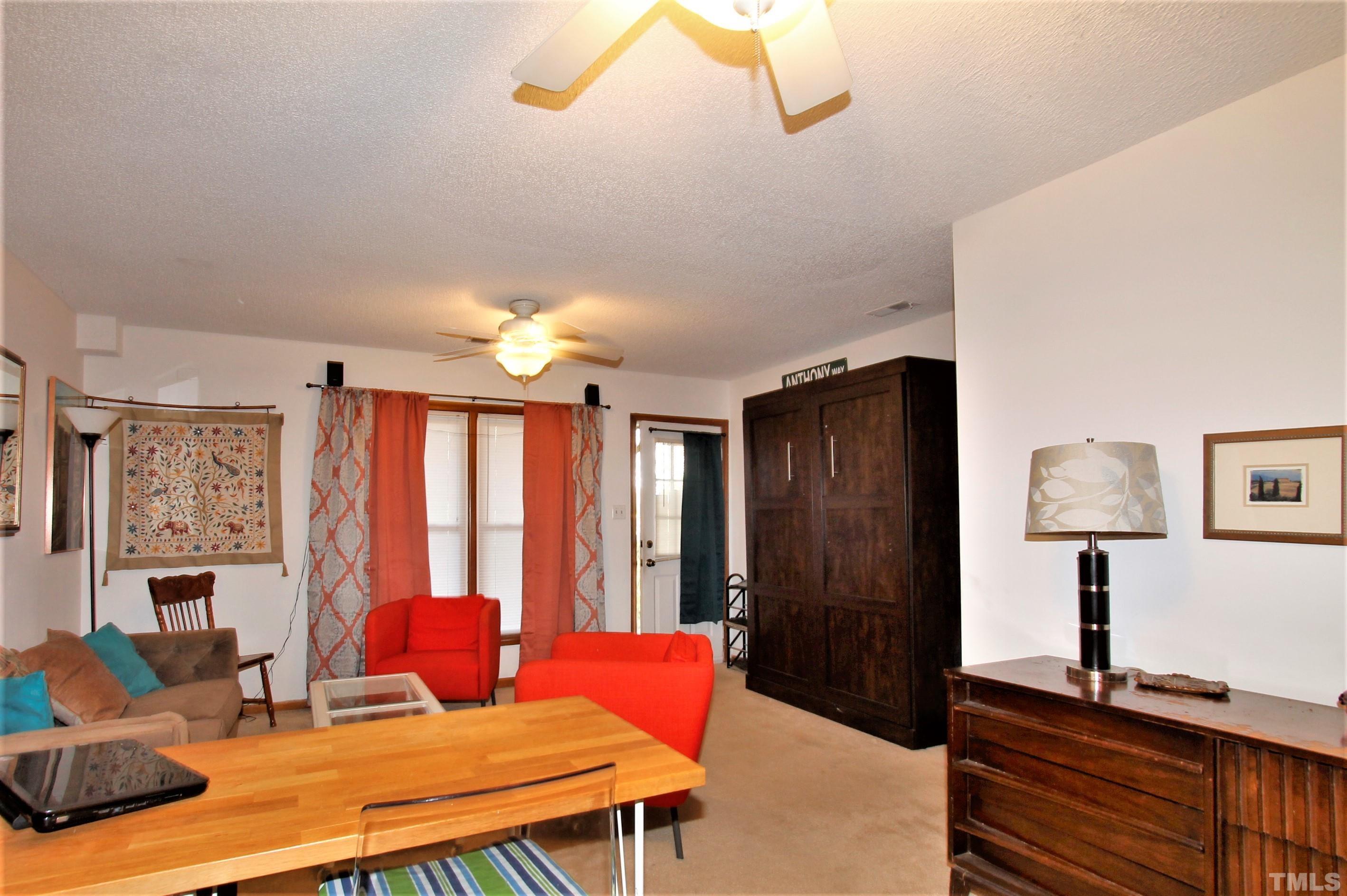 17 Prestwick Place, Unit 17 Durham, NC 27705 - Photo 24 of 27 a bedroom with furniture and a window