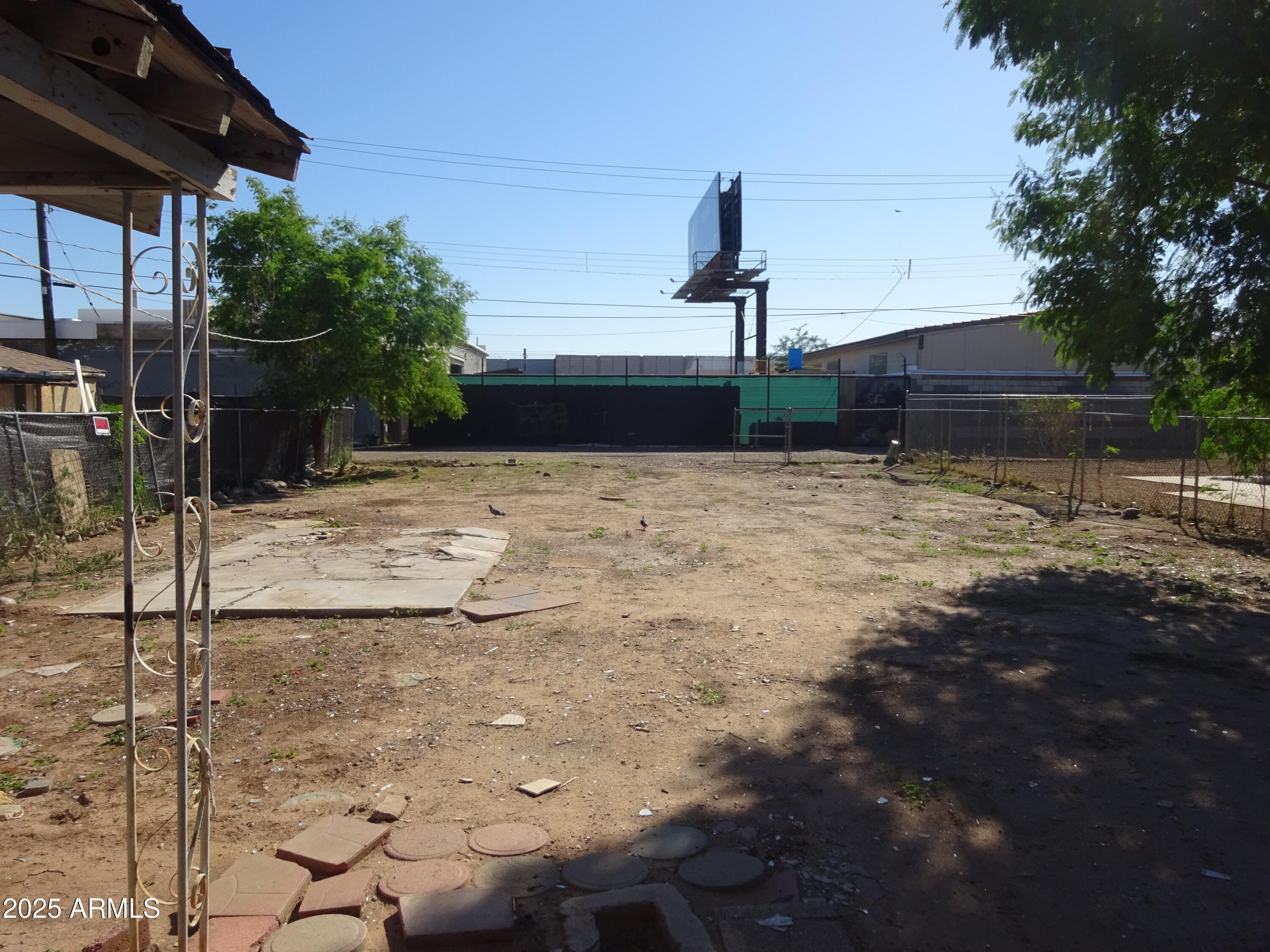 2821 East Adams Street Phoenix, AZ 85034 - Photo 11 of 17 a view of a backyard of a house