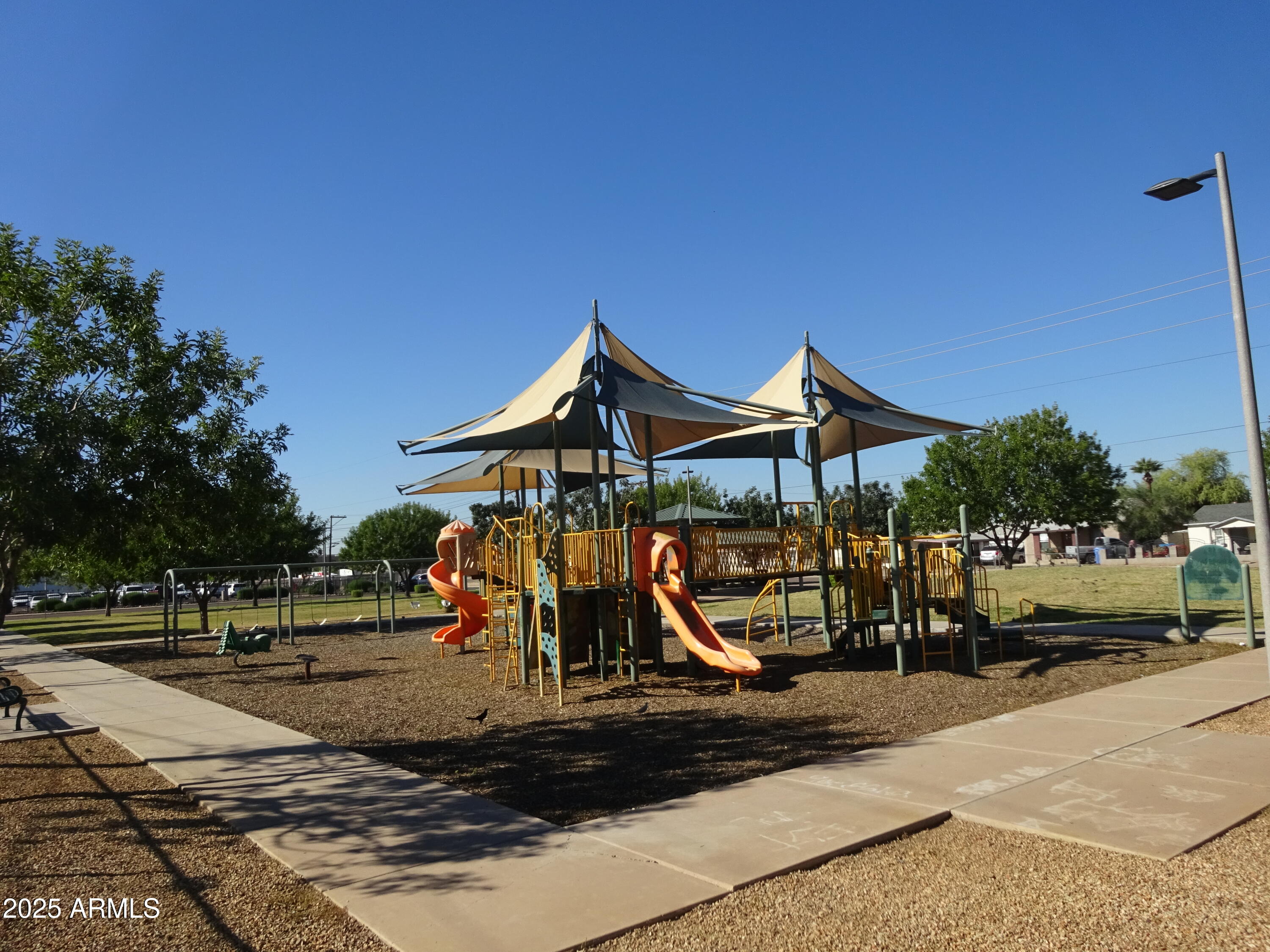2821 East Adams Street Phoenix, AZ 85034 - Photo 16 of 17 a view of outdoor space with playground
