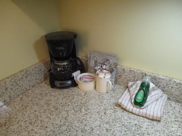 a view of a fruit basket and water heater