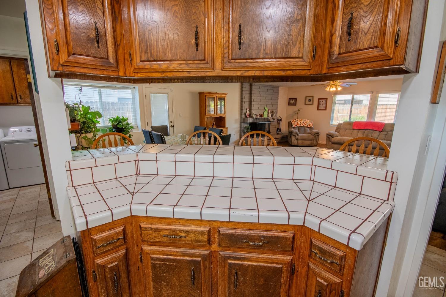 Undisclosed Address Bakersfield, CA 93309 - Photo 15 of 46 a view of a refrigerator and window in the house