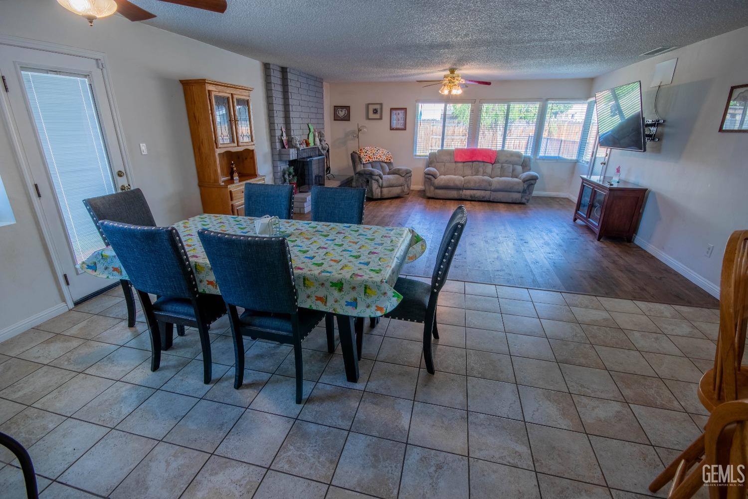 Undisclosed Address Bakersfield, CA 93309 - Photo 17 of 46 a view of a dining room with furniture