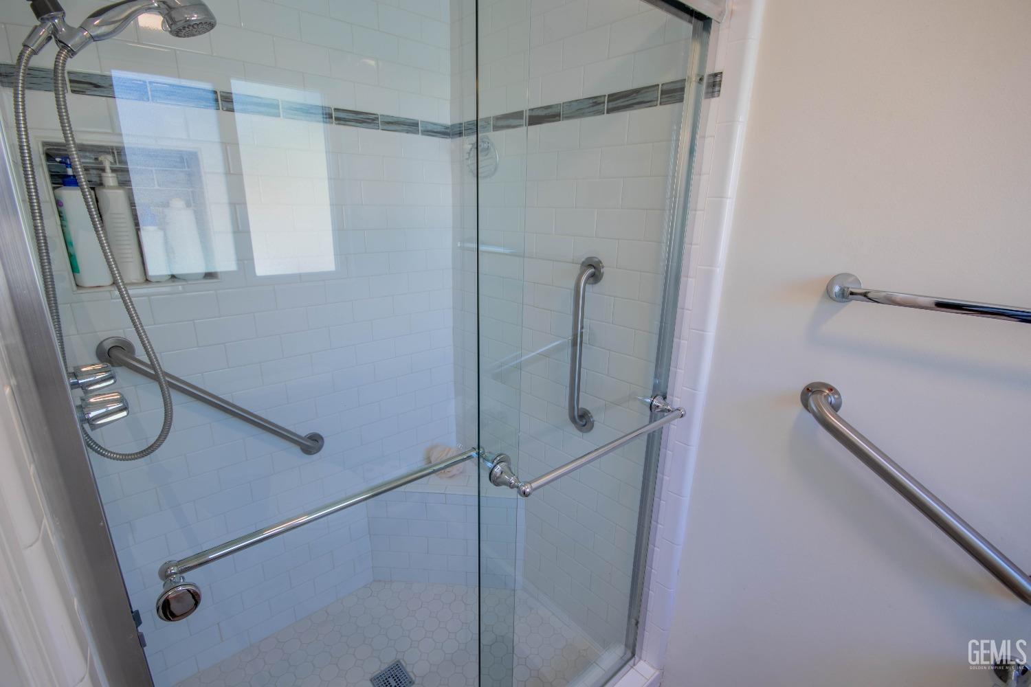 Undisclosed Address Bakersfield, CA 93309 - Photo 23 of 46 a bathroom with a shower