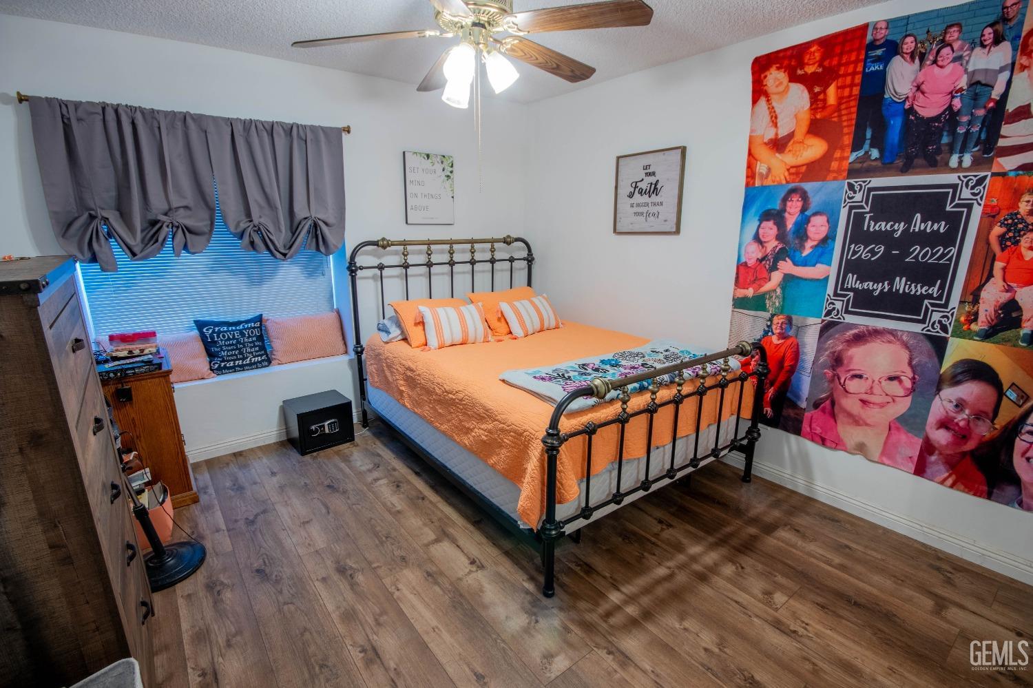 Undisclosed Address Bakersfield, CA 93309 - Photo 29 of 46 a bedroom with furniture and a baby crib