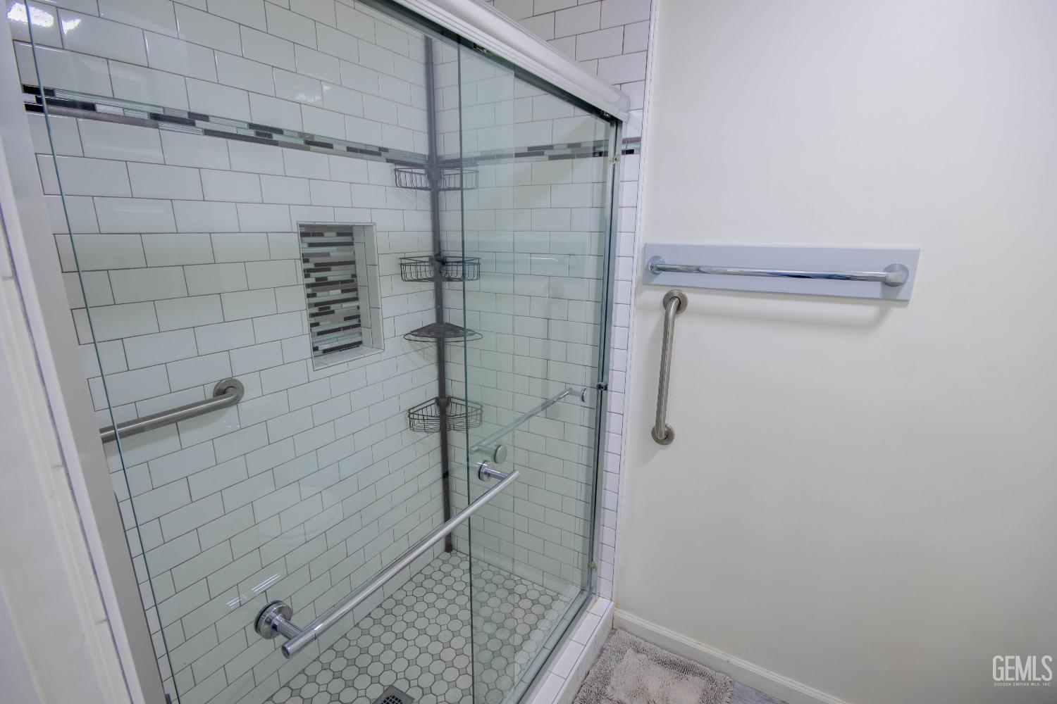 Undisclosed Address Bakersfield, CA 93309 - Photo 31 of 46 a bathroom with a shower