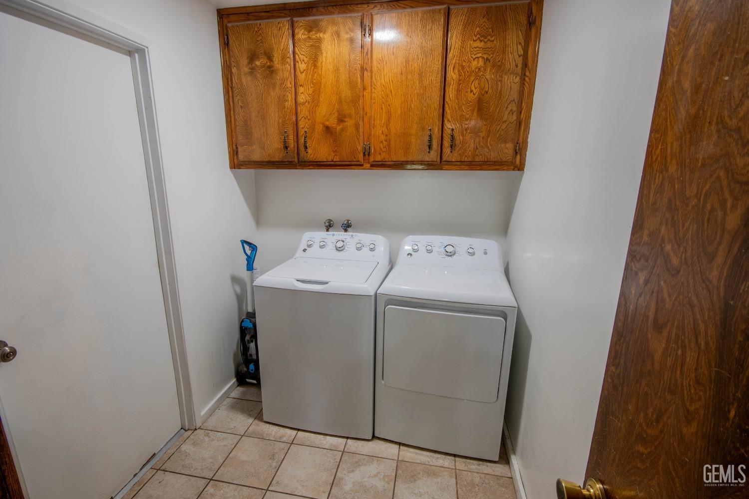 Undisclosed Address Bakersfield, CA 93309 - Photo 32 of 46 a utility room with dryer and washer