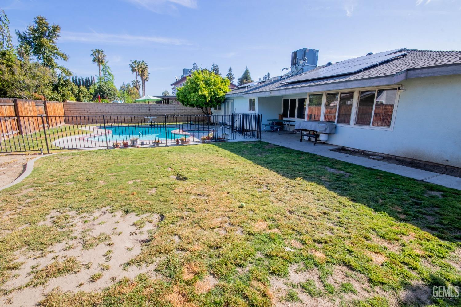 Undisclosed Address Bakersfield, CA 93309 - Photo 40 of 46 a view of an house with backyard space and balcony