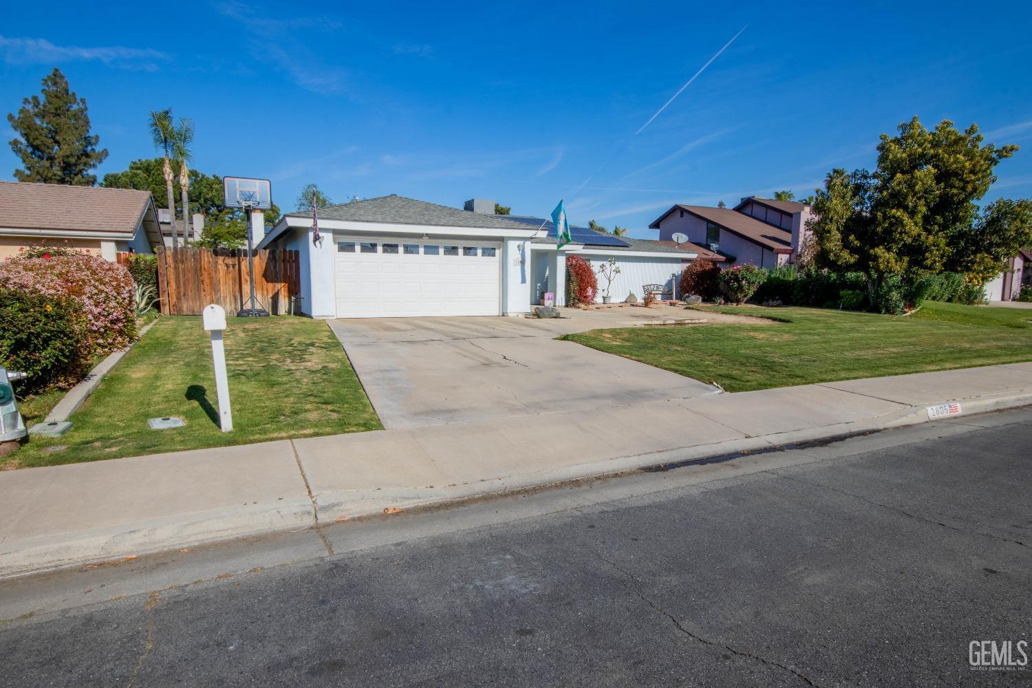 Undisclosed Address Bakersfield, CA 93309 - Photo 4 of 46 a view of a back yard of the house