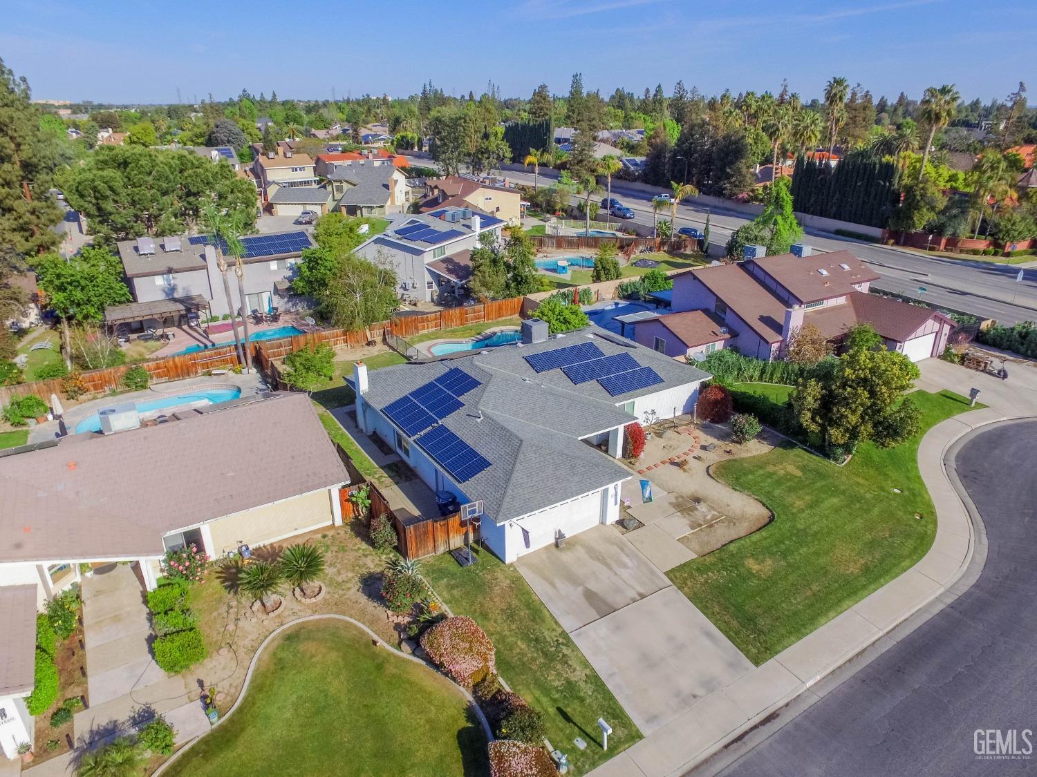 Undisclosed Address Bakersfield, CA 93309 - Photo 42 of 46 an aerial view of a swimming pool patio and mountain view