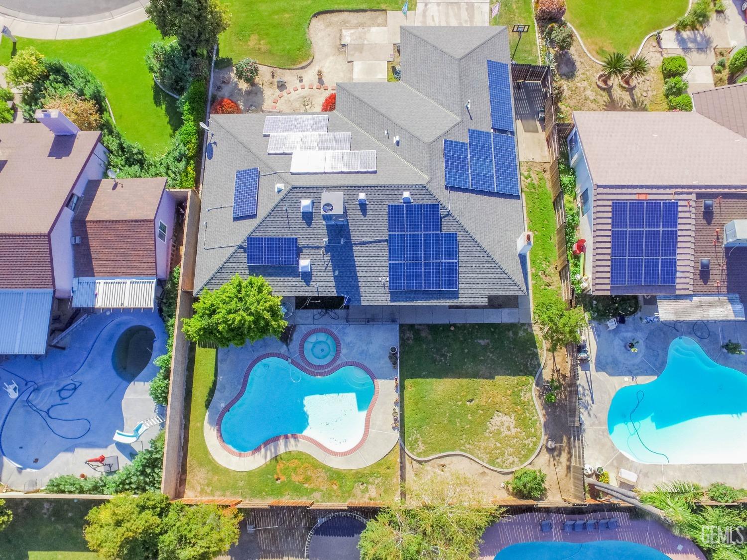 Undisclosed Address Bakersfield, CA 93309 - Photo 46 of 46 an aerial view of residential house with pool and yard