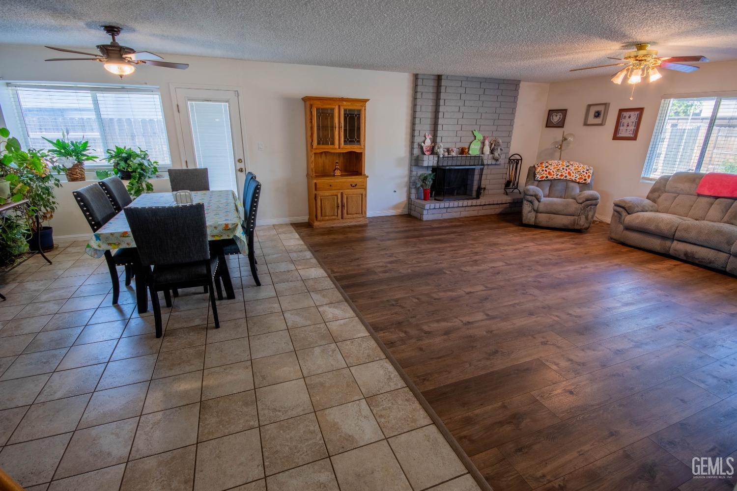 Undisclosed Address Bakersfield, CA 93309 - Photo 10 of 46 a living room with furniture