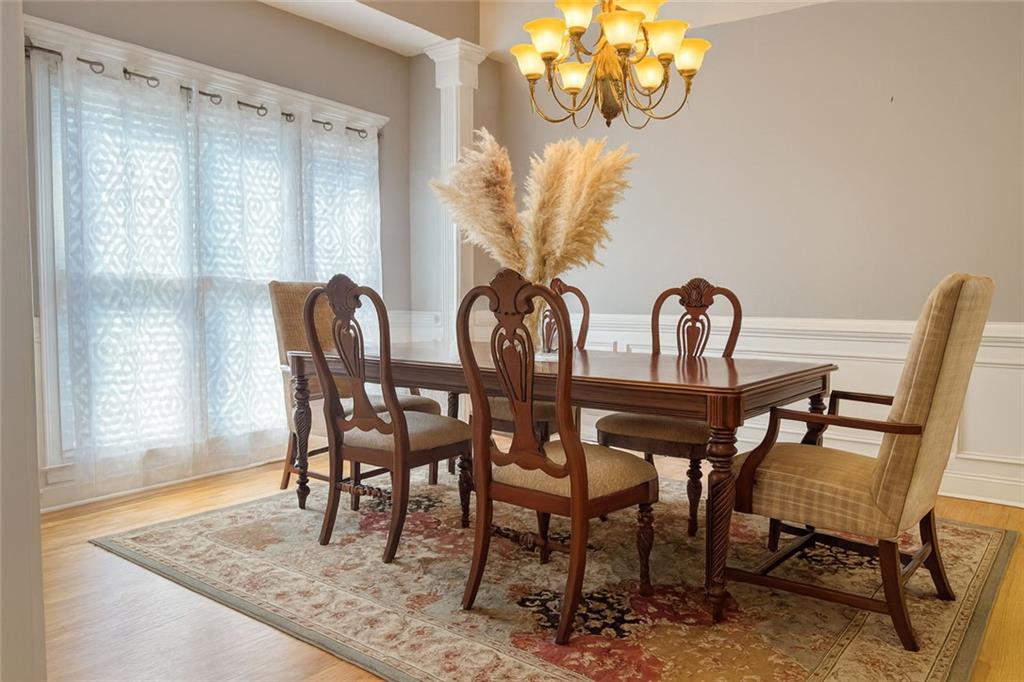 2014 Hubbard Court Villa Rica, GA 30180 - Photo 19 of 41 a view of a dining room with furniture and chandelier